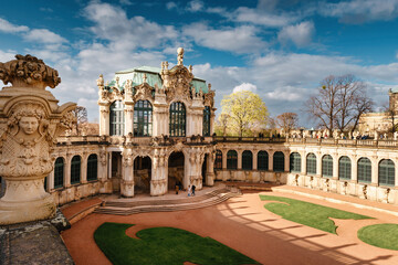 Fototapeta premium Magnificent Dresden Zwinger Baroque Palace Courtyard Beneath Vibrant Blue Spring Sky