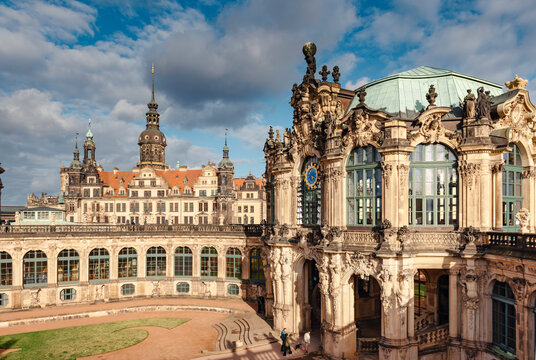 Iconic Dresden Zwinger Palace and Royal Castle Beneath Dramatic Blue Cloudy Sky