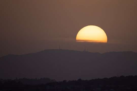 setting sun behind the Tramuntana mountain range in Mallorca