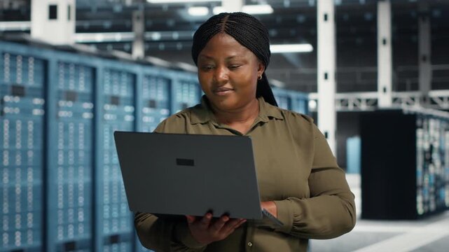 Admin uses device in a data center for equipment checkups, infrastructure maintenance, network monitoring and steady IT infrastructure control within a practical data center workflow.