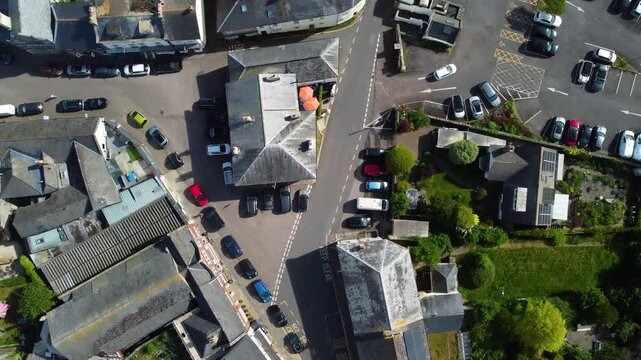 Traditional Colyton village streets, parked cars and rooftops seen from directly overhead in East Devon.