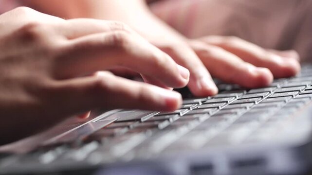 4K close-up footage of hands typing on a keyboard, capturing modern digital work, productivity, and everyday office or tech-related activity.