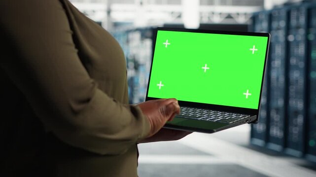 Amazed woman reacts to trending video feeds near a video wall, with connected screens suggesting streaming videos, online video platform, social media videos and flexible modern content discovery.