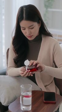 woman take or eat medical pill for treatment healthcare