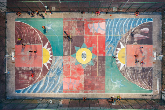 Aerial top view of a colorful painted basketball court, Recife, Pernambuco, Brazil