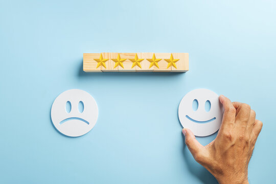 Customer satisfaction improve experiance concept, smiling face replaces sad face, showing service before and after, five stars indicate excellent rating, positive client feedback
