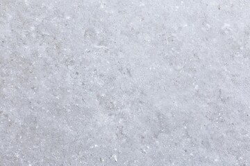 Fototapeta premium The concrete surface texture with subtle speckles and weathered finish