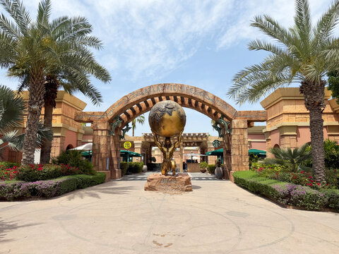 Dubai, UAE - 5 April 2026: Iconic globe sculpture at Aquaventure World in Atlantis The Palm surrounded by palm trees and landscaped walkways. Popular attraction for visitors in Dubai