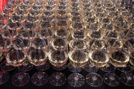 Rows of wine glasses prepared for event in Ukraine