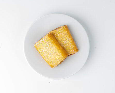 Fig roll bar, square sugar cookies with fruit filling isolated. Taiwanese pineapple cake, brown rectangular strudel biscuits, sweet apple roll pastry on white background