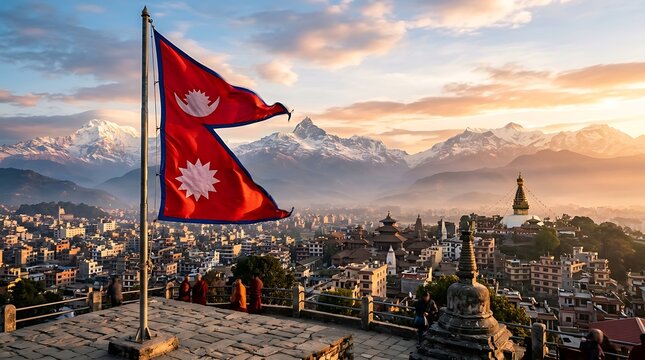 Waving Nepal flag over Pokhara city landscape with snowy Himalayan mountains at golden sunset