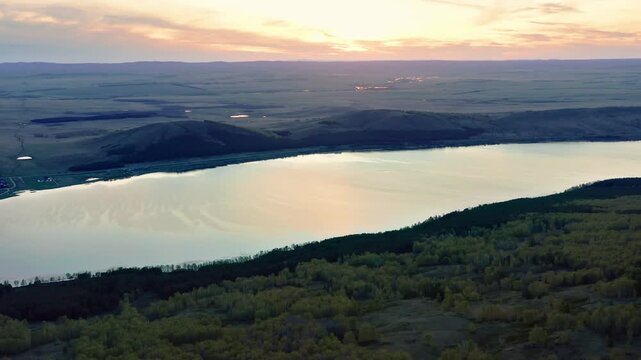 Southern Urals in spring: Irendyk ridge and Talkas Lake at sunset.