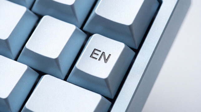 The EN button on the blue keyboard is a close-up. Language selection, English layout, Translator, English, English