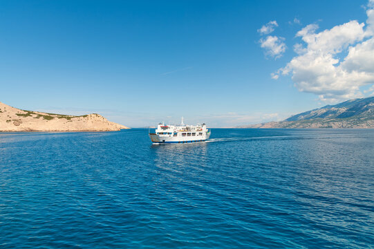 Car and passenger ferry crossing Adriatic to Pag island, Croatia