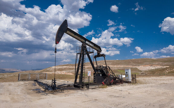 Aerial View of Oil Pumpjack in Rural Landscape &ndash; Petroleum Extraction and Fossil Energy Production Site