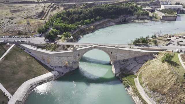 Cinematic View of Malabadi Bridge in Diyarbakir, Turkiye &ndash; Medieval Stone Arch Bridge Above Batman River