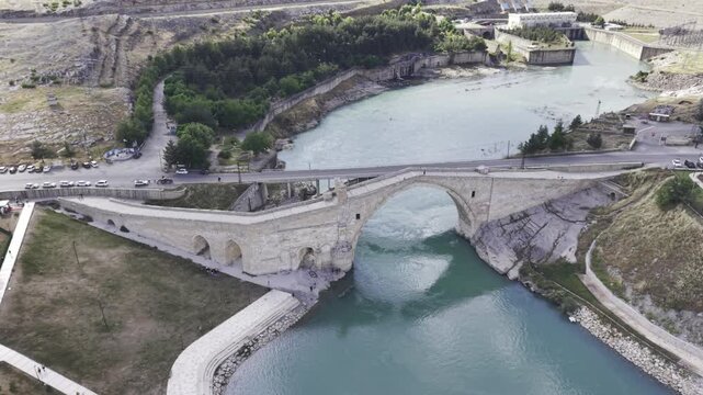 Cinematic View of Malabadi Bridge in Diyarbakir, Turkiye &ndash; Medieval Stone Arch Bridge Above Batman River