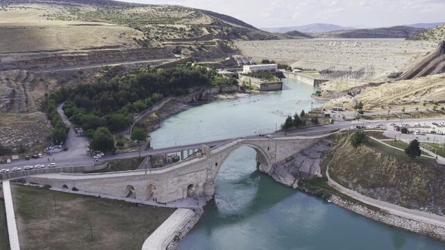 Cinematic View of Malabadi Bridge in Diyarbakir, Turkiye &ndash; Medieval Stone Arch Bridge Above Batman River