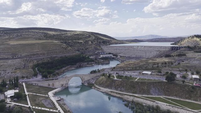 Cinematic View of Malabadi Bridge in Diyarbakir, Turkiye &ndash; Medieval Stone Arch Bridge Above Batman River