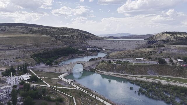 Cinematic View of Malabadi Bridge in Diyarbakir, Turkiye &ndash; Medieval Stone Arch Bridge Above Batman River