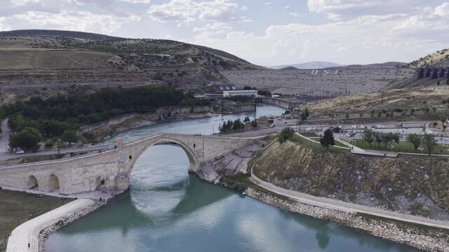 Cinematic View of Malabadi Bridge in Diyarbakir, Turkiye &ndash; Medieval Stone Arch Bridge Above Batman River