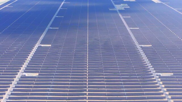 Aerial drone view of large solar panel power station in northwest China, renewable energy base on desert land，new energy, solar energy