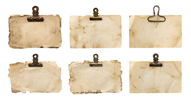 Vintage collection of old, stained paper pieces with paper clips with torn edges of lining papers, isolated on a transparent Background PNG
