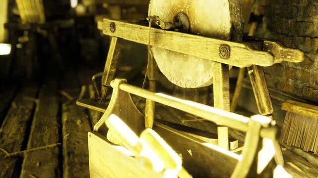 Open toolbox at sharpening station with chisels and blades, golden light, rustic textures emphasizing careful tool organization and workshop routine