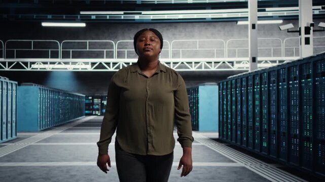 Software developer works inside a data center to support equipment checkups, infrastructure upgrades, AI development and organized technical operations within a practical data center workflow.