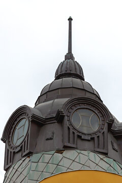 Black Dome With Lightning Rod Spire at Top of Old Building