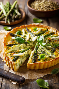 Asparagus Tart with Creamy Filling and Fresh Herbs. AI generative.