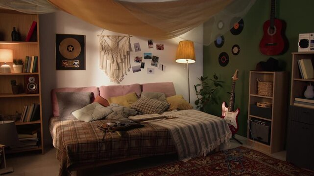 Music themed teenager bedroom displaying guitars, vinyl records, and bookshelves during slow zoom out. Footage for youth lifestyle ads or music education marketing campaigns