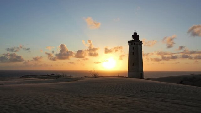 Rubjerg knude lighthouse at sunset on the danish coast