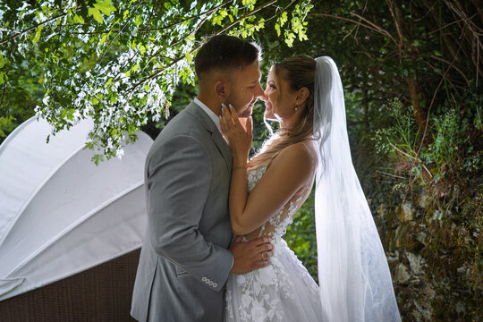  happy, laughing bride and groom at the wedding. Celebrate an emotional wedding.