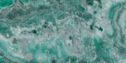 Elegant emerald green onyx marble texture with translucent layers and natural stone veins. © Vidal