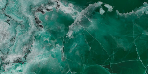 Elegant emerald green onyx marble texture with translucent layers and natural stone veins. © Vidal