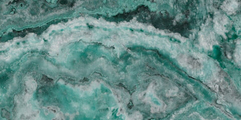 Elegant emerald green onyx marble texture with translucent layers and natural stone veins. © Vidal