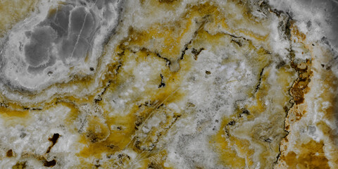 Luxury gold and gray onyx marble texture with natural mineral patterns and elegant stone veins. © Vidal