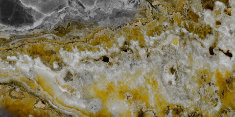 Luxury gold and gray onyx marble texture with natural mineral patterns and elegant stone veins. © Vidal
