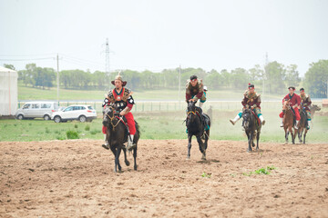 Obraz premium Mongolian equestrian performance at Kulun Nuoer Scenic Area, Guyuan County, Hebei Province