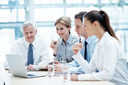 Corporate, team and manager at law firm with laptop, paralegal and lawyer research for litigation. Attorney, people and planning in office with computer, strategy and administration for court case.