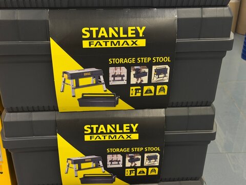 Mallorca, spain, june 27, 2026, stanley fatmax storage step stools stacked on display, featuring branding and product information for multi functional tool organization
