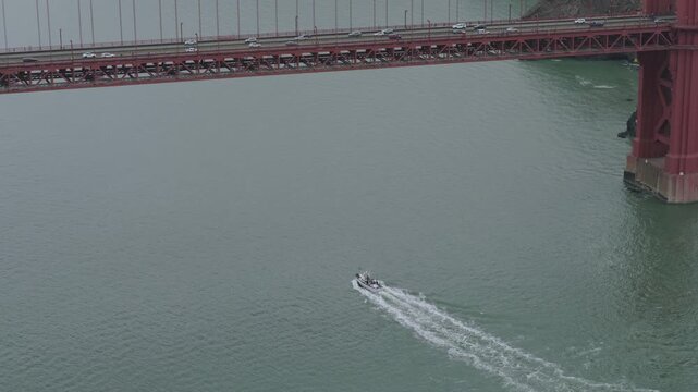 Motorboat Underway Beneath Golden Gate Bridge - High, Aerial Shot