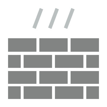 Grey brick wall with three falling bricks on white background