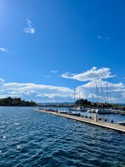 Fototapeta premium Marina with sailboats moored along a wooden pier in Son, Norway