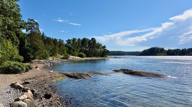 People enjoying summer day on the beach in Son, Norway