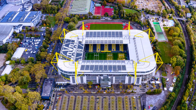 Top-down aerial view of Signal Iduna Park stadium with club crest and solar panels on the roof, Dortmund, Germany