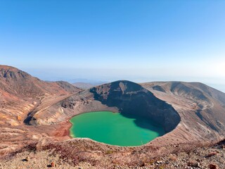 Crater Lake with Turquoise Water in Volcanic Landscape © youyuu.photo