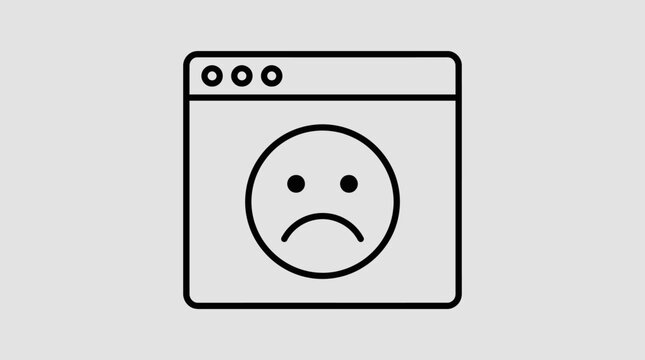 Sad face emoticon on computer screen.