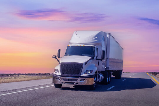 Truck driving on highway,  Commercial vehicle transport for logistics and shipping.	